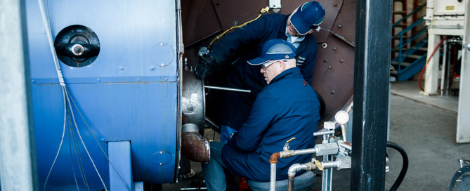 Clearsign research scientists working in Cleaver Brooks boiler